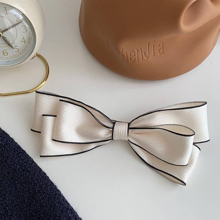 Pince à cheveux en forme de nœud à l'arrière de la tête, clip supérieur de qualité supérieure pour la vente par Lily Clothing