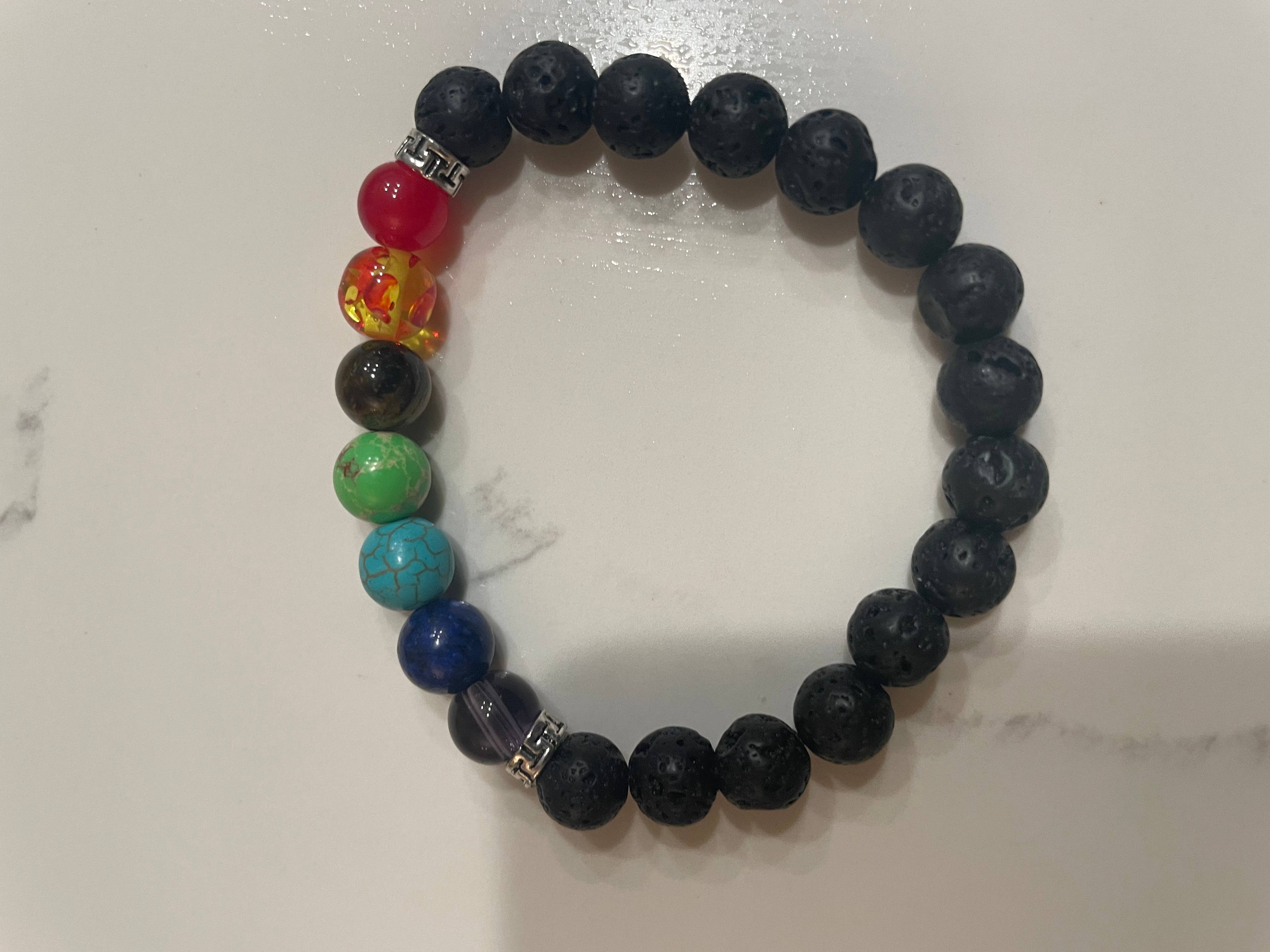Siman International Inc. - Wholesale Beaded Bracelet - Lava Bead stretch bracelets with the 7 Chakra’s1