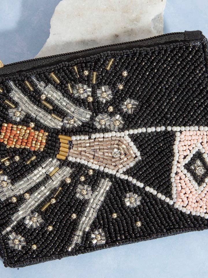 Sparkling Champagne Bottle Seed Beaded Coin Purse and other Purchase Wholesale sequin top with champagne bottle. Free Returns & Net 60 Terms on Faire trending on Faire.