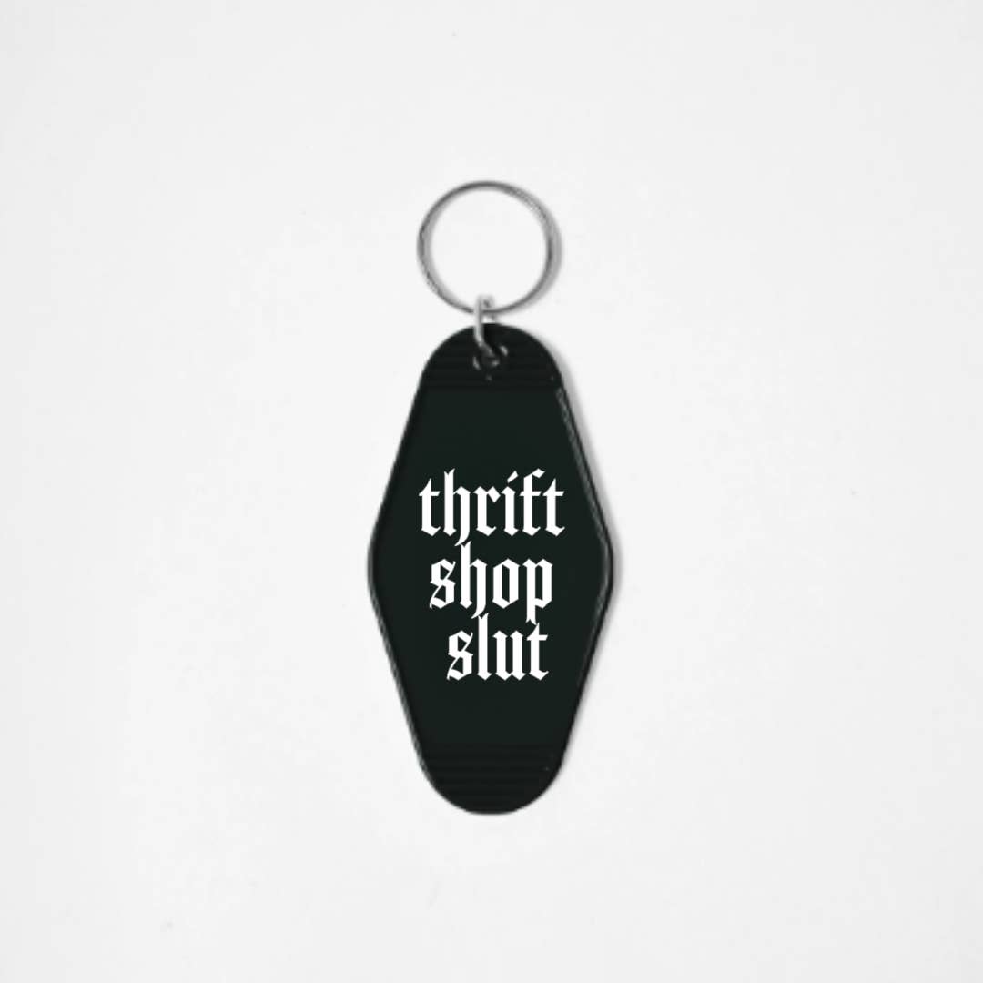 Wickedly Divine Shop - Vendita all'ingrosso Portachiavi - Donna - Portachiavi Motel Gotici Spiritosi con Design in Vinile Bianco