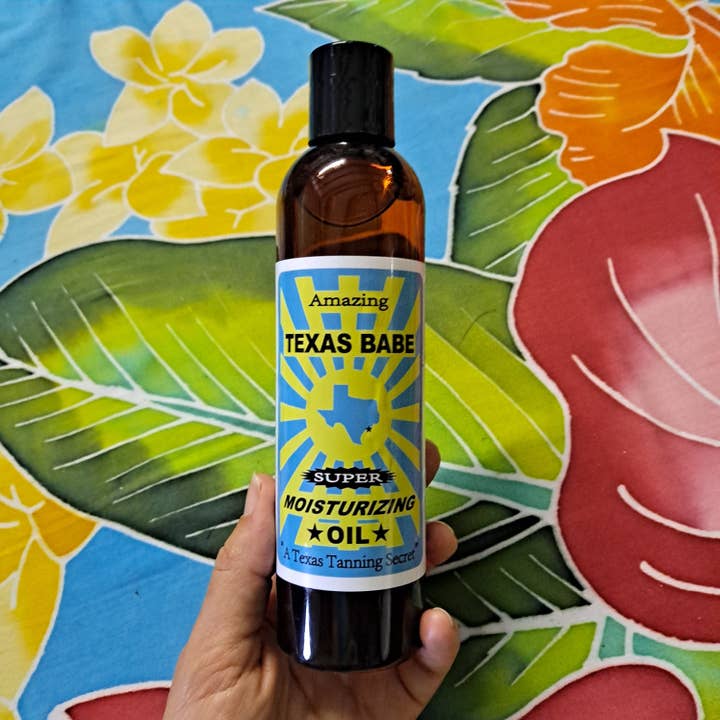 Texas Babe Moisturizing Oil for wholesale by Island Style Clothing Co by Akamai Distribution Ltd