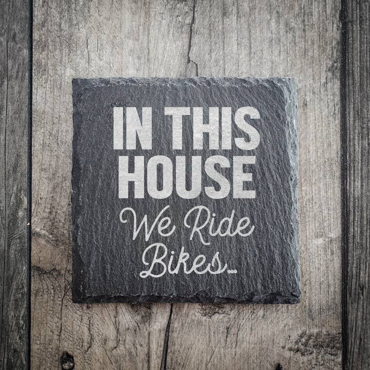 In This House We Ride Bikes Riven Slate Coaster for wholesale by EllieBeanPrints
