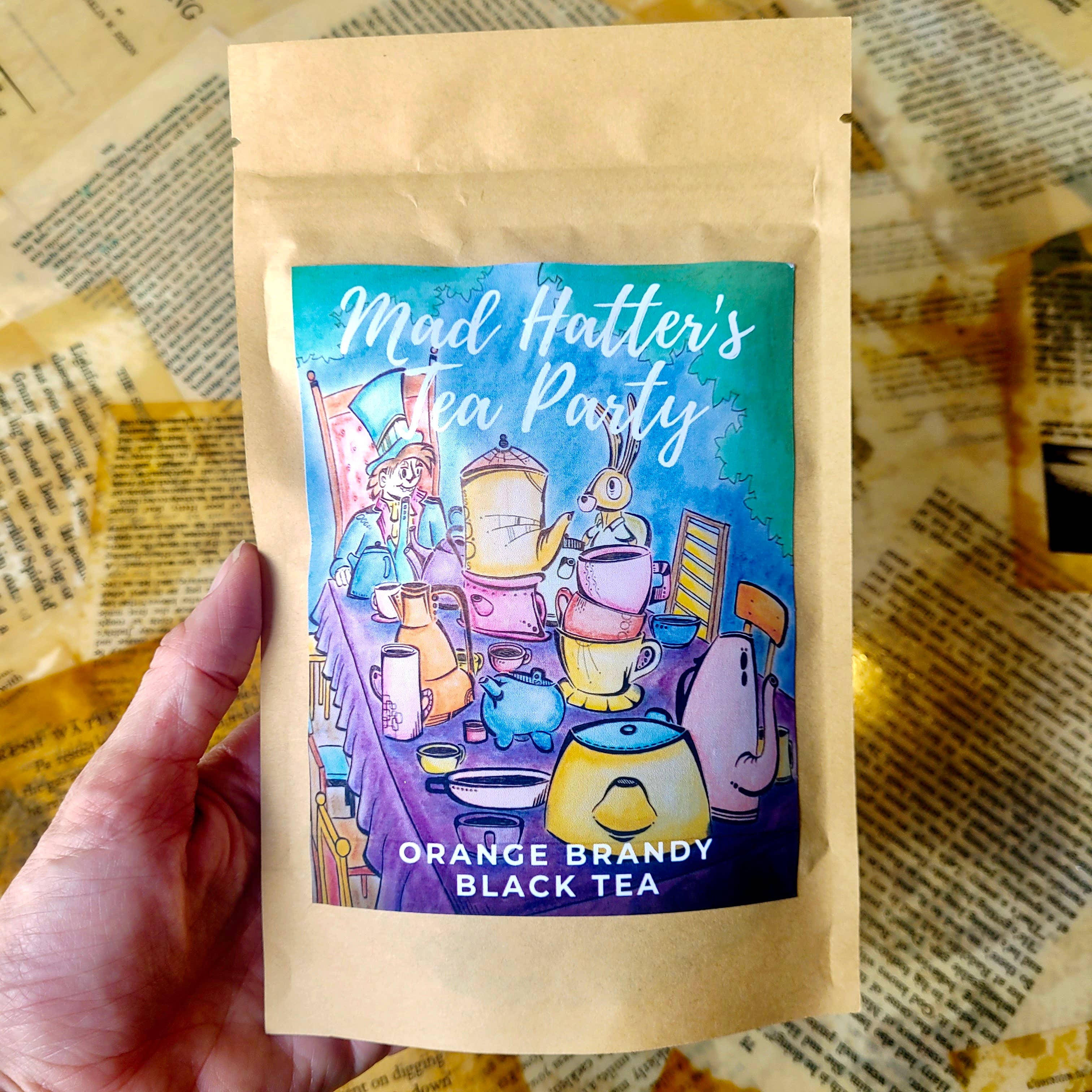 NovelTea Bookstore & Gifts - Venta al por mayor Tés a granel - Inspirado en la Fiesta del Té del Sombrerero Loco - Brandy de Naranja SIN ALCOHOL1