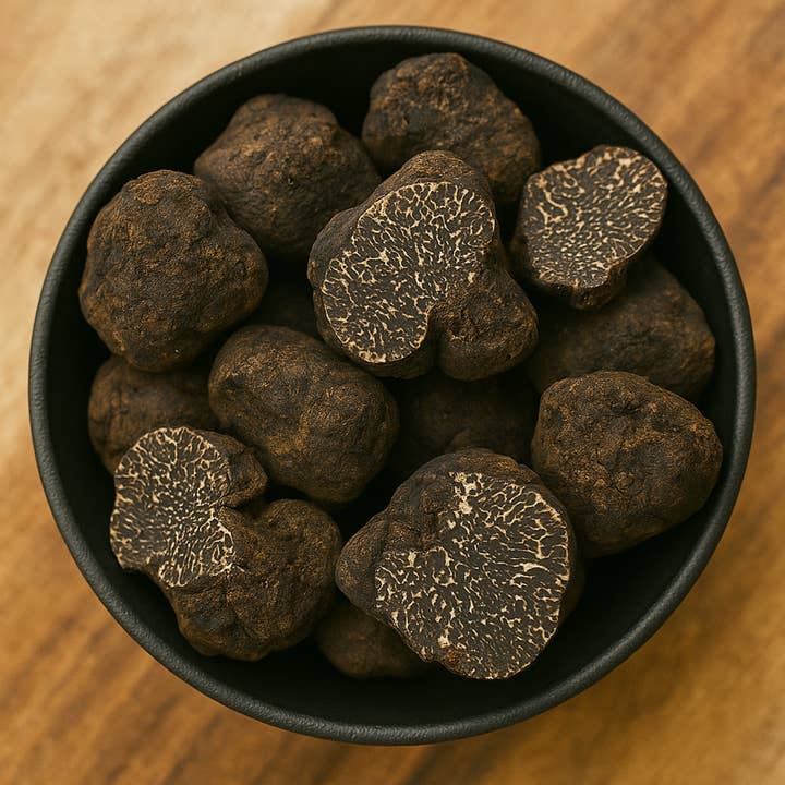Svart tryffel i bitar (Tuber Melanosporum) för wholesale av LA Herb