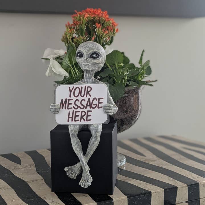 Customizable 'Milkyway Messenger' 10" H Alien Shelf Sitter for wholesale by John Bernard & Company