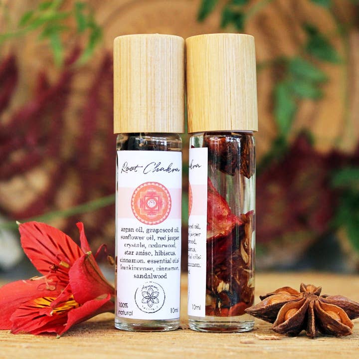 Rotchakra balanserande olja med örter och kristaller för wholesale av Ayamani Naturals
