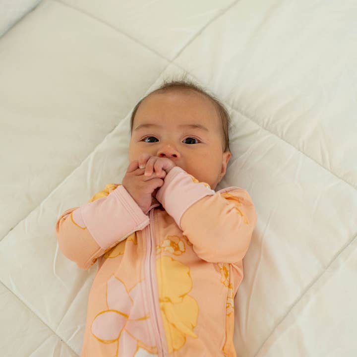 Long Sleeve Keiki Romper in Guava Jelly for wholesale by Paradise Now Hawaiʻi