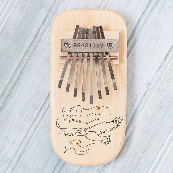Eagle Engraved Thumb Piano for wholesale by Mountain Melodies LLC