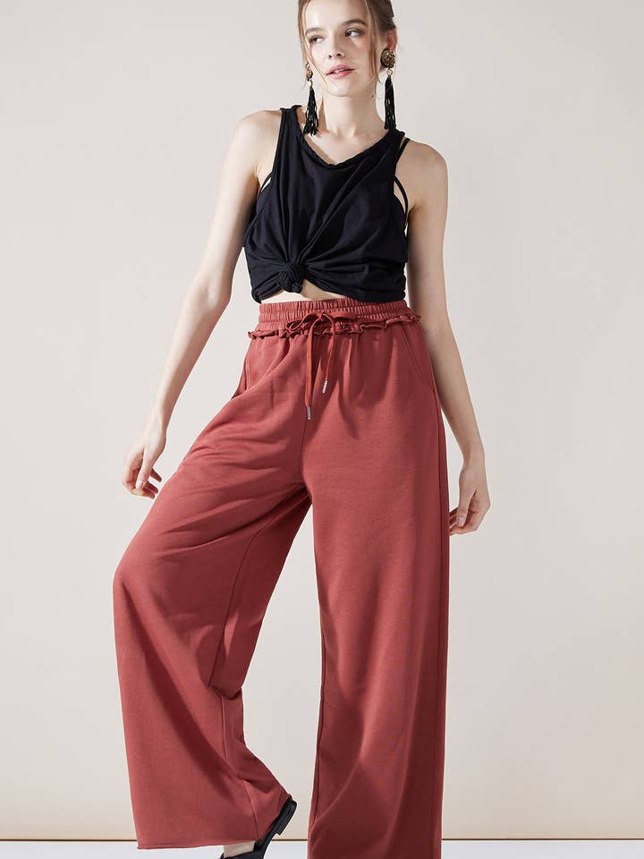 INP1006 Calças de Treino de Pernas Largas com Bainha Desfiada -6pcs $7.99 por atacado de noflik