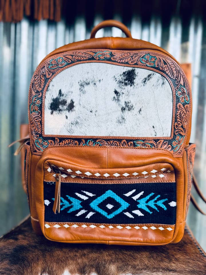 Tooled with cowhide and embossed leather for wholesale by FRINGE & LUXE
