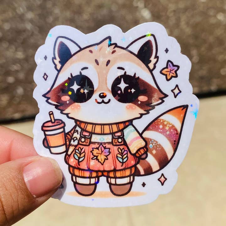 Autocollant holographique raton laveur à la citrouille épicée* pour la vente par Kailex Boutique Wholesale