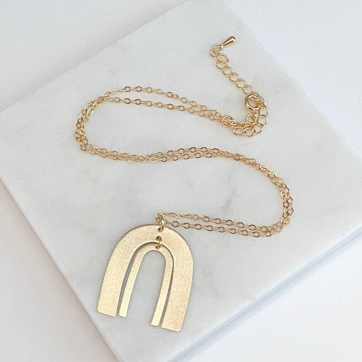 Modernist Textured Arch Brass Necklace for wholesale by Alison Kelley Designs