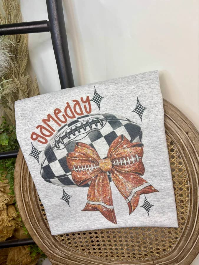 Gameday Checkered Football with Bow (Gildan Sub T-Shirt) for wholesale by 1/2 Penny Wholesale