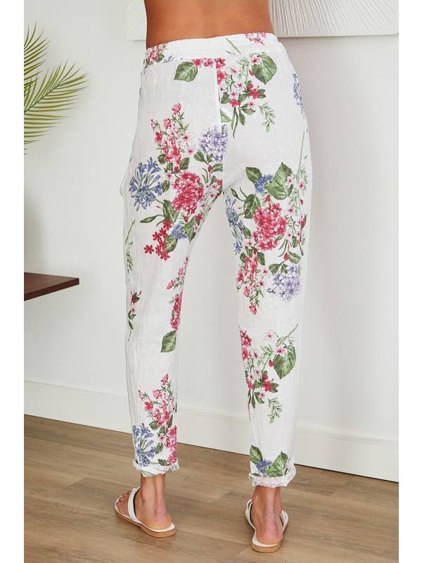 Wit LINNEN BROEK MET BLOEMENPRINT EN PAILLETTEN ZIJSTREEP (16-08-FLORAL) voor groothandel op Faire2