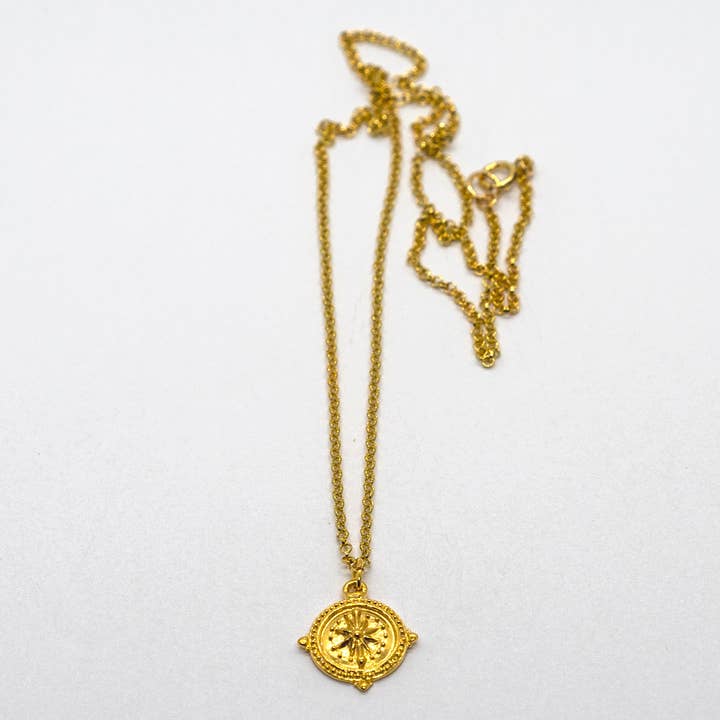 Gold compass pendant necklace for wholesale by Sista Jewelry
