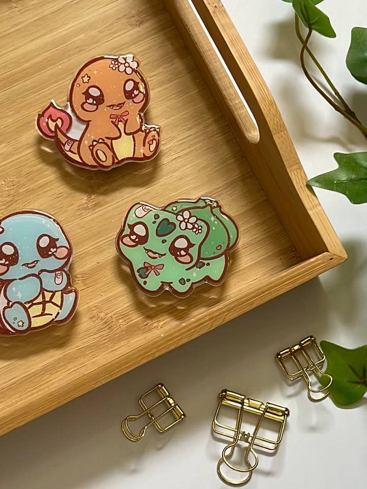 Pika Friends Kanto Region Glitter Epoxy Acrylic Phone Grips for wholesale by Peony Lee Art