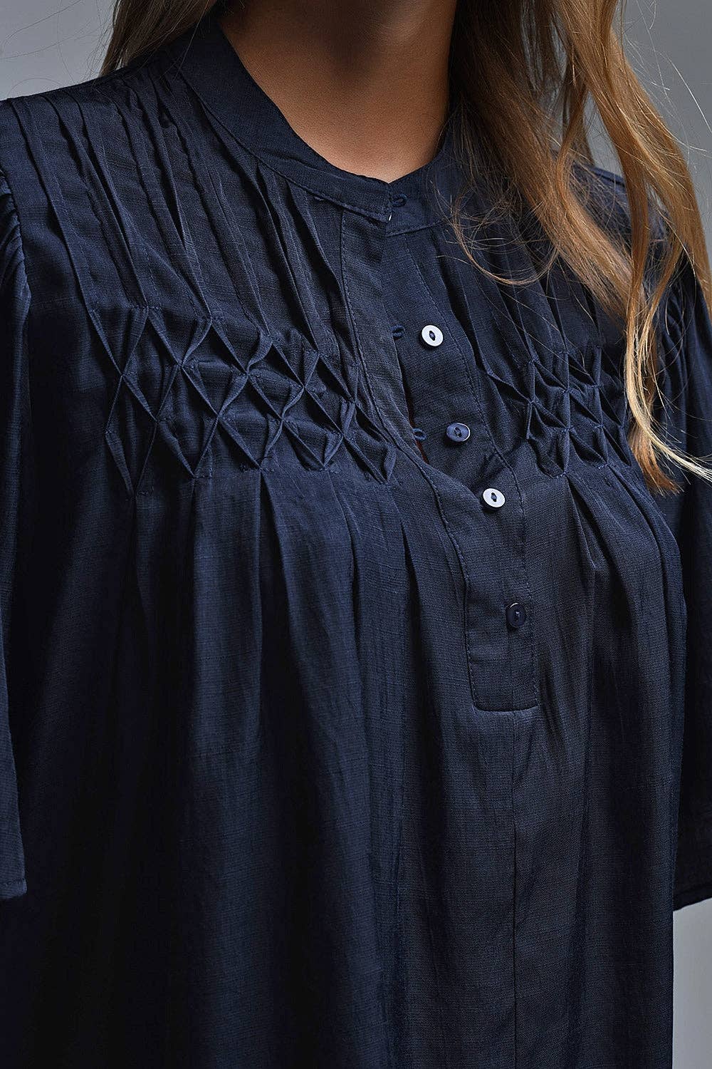 Relaxed Navy boho-style blouse with embroidered details for wholesale on Faire4