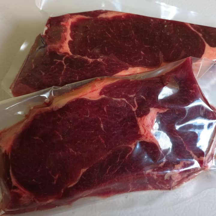 Berbician - Wholesale Ribeye - Bison Striploin Steaks