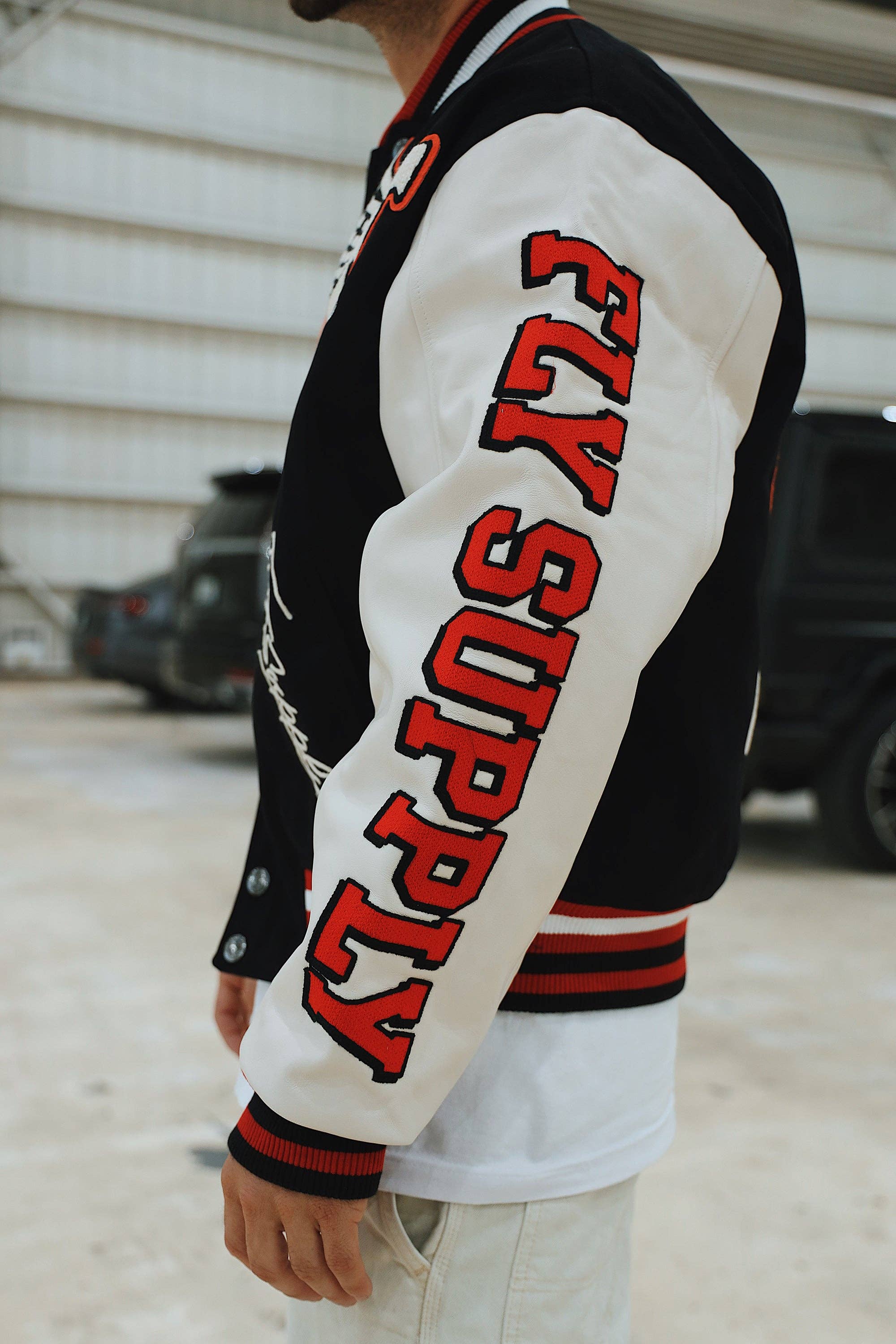 Denim Manifest Varsity Jacket (Black) for wholesale on Faire8