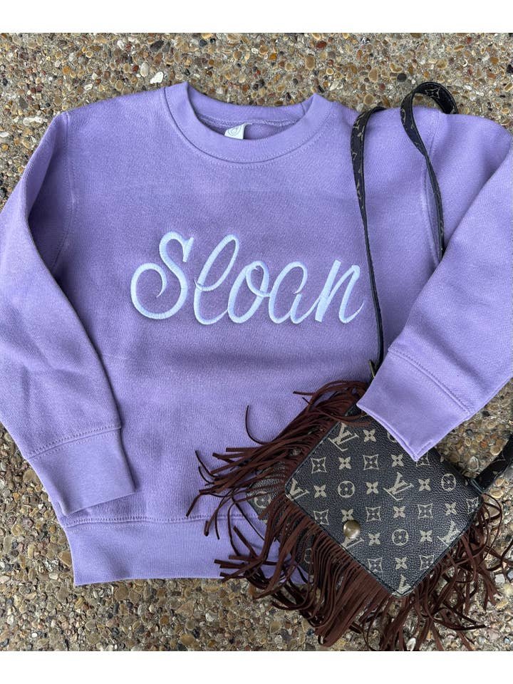 Violet Custom Embroidered Name Youth Sweatshirt for wholesale on Faire