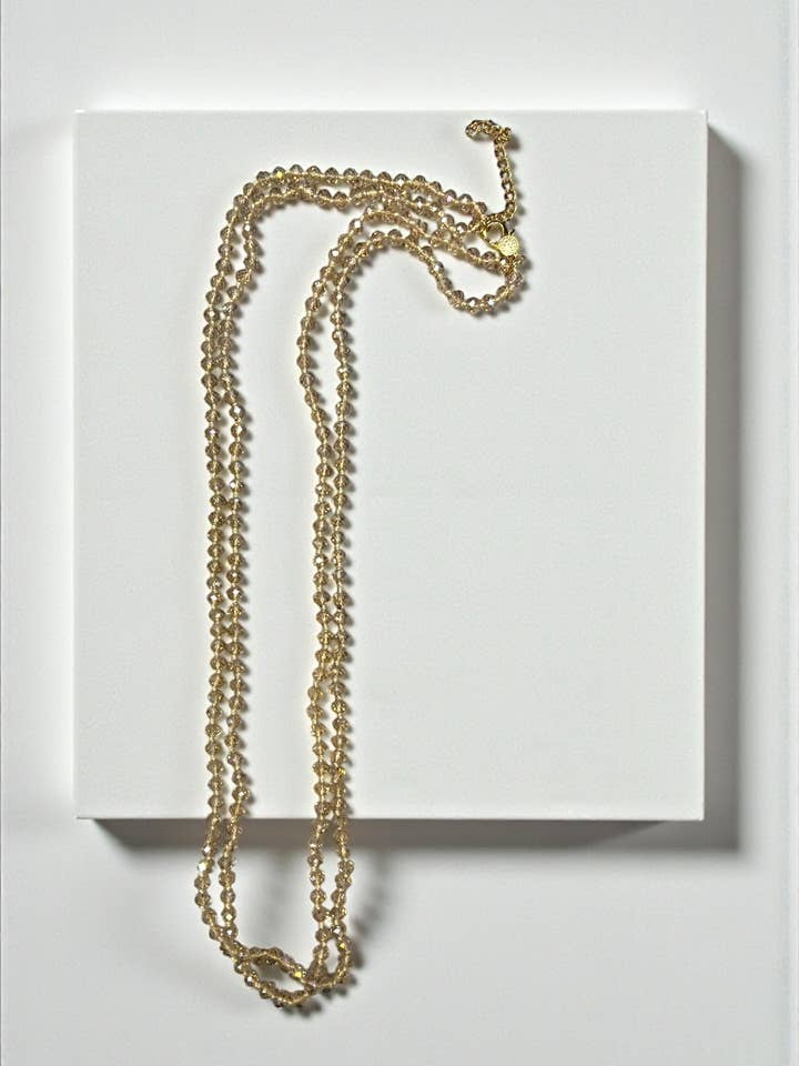 Dubbele streng handgeknoopte Champagne 6mm vibes ketting van 30". voor wholesale door Ava Capri