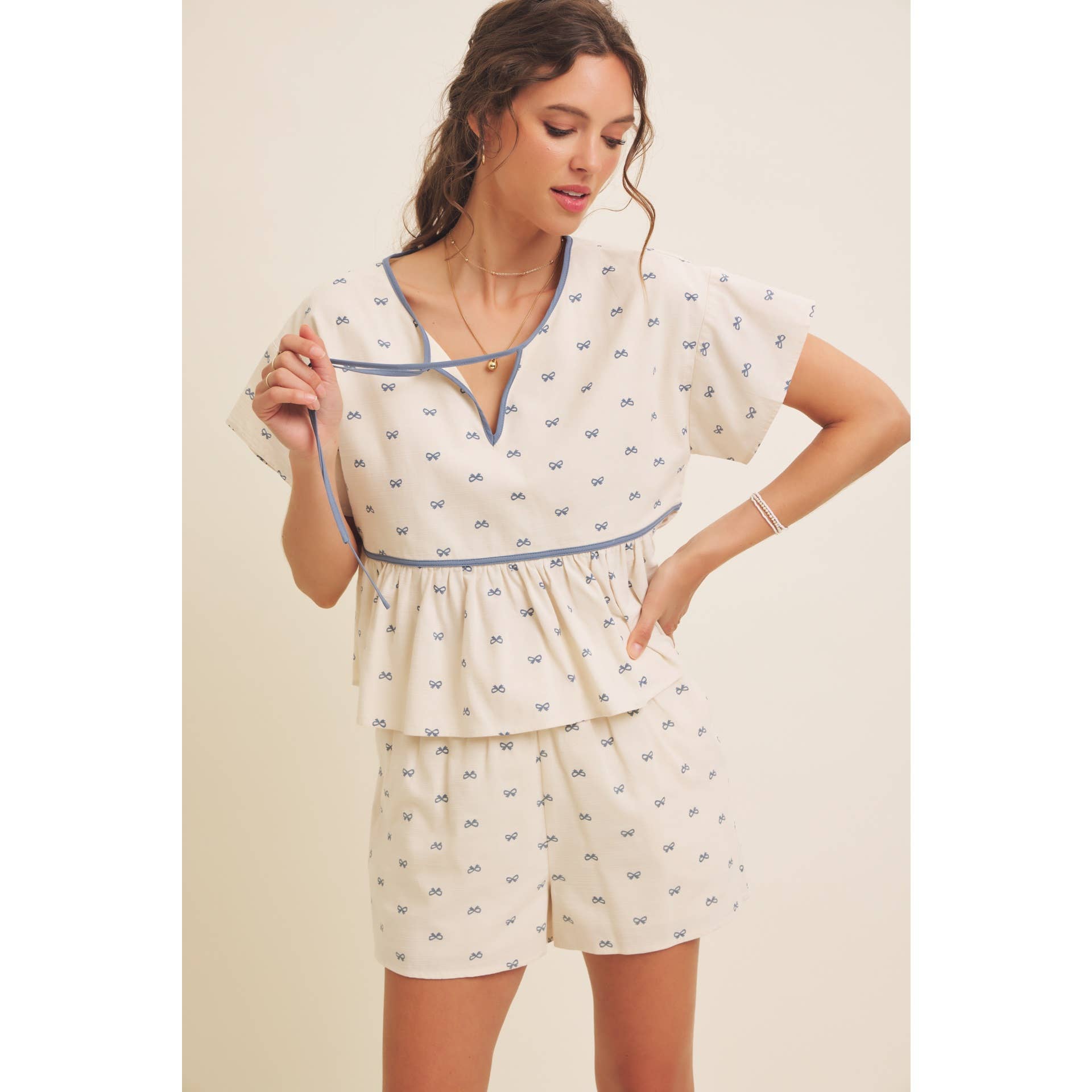 in february - Wholesale Blouse - Women's - SUNNY DAYS BOW PRINT BABYDOLL BLOUSE WITH CONTRAST BINDING2