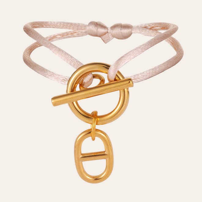 STÅLSNÖDARMBAND för wholesale av WHOOPSY DAISY