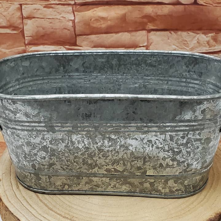 A.T. Imports - Vendita all'ingrosso Fioriere - Piccolo Vaso Ovale in Metallo1