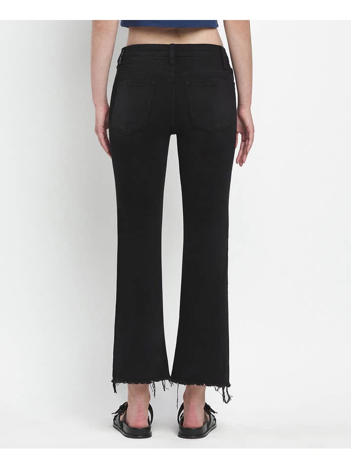 GRANDIOSITÀ JEANS CROP FLARE A VITA MEDIA CON ORLO INVECCHIATO E ORLO GREZZO LV1145 in vendita all'ingrosso su Faire1