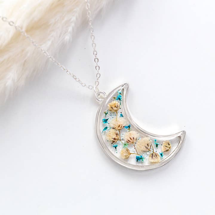 LUNA crescent moon necklace with real dried flowers in resin for wholesale by Allie and Posie
