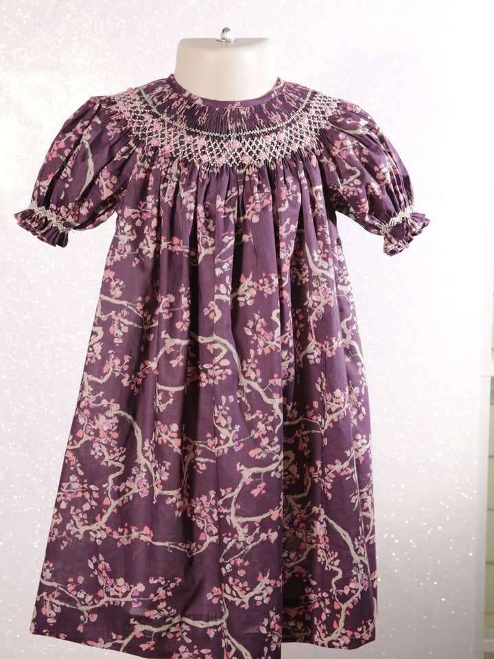 Plum Printed Smocked Short Sleeve Bishop Dress for wholesale by Hello Bebes!