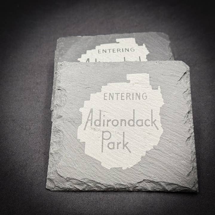Entering the ADK Sign 4 Inch Square Engraved Stone Coaster for wholesale by Adirondack Etching LLC