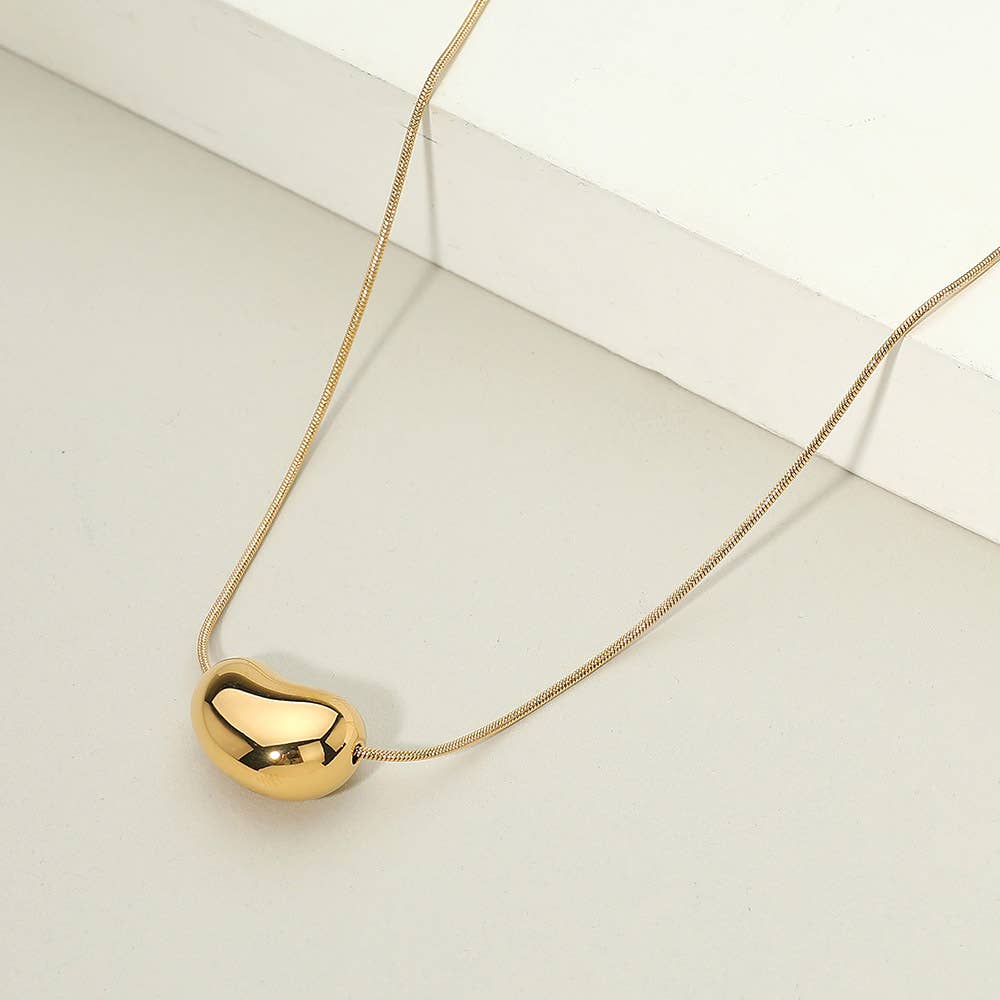 Sensibling Corp. - Venta al por mayor Collares con colgantes/abalorios - Collar con colgante de frijol de acero inoxidable bañado en oro de 18 quilates1