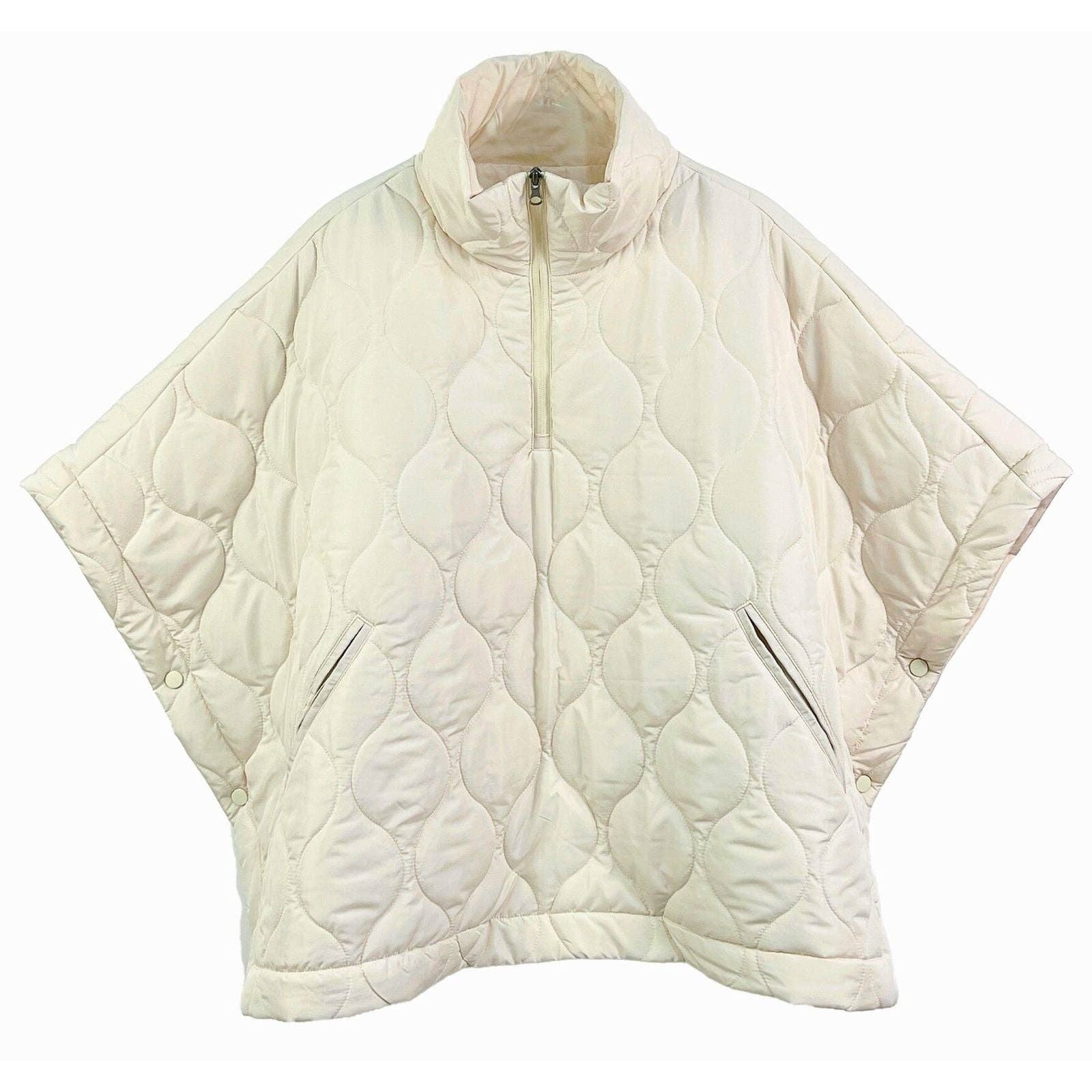 Ivory Quilted Puffer Half Zip Poncho for Women for wholesale on Faire1