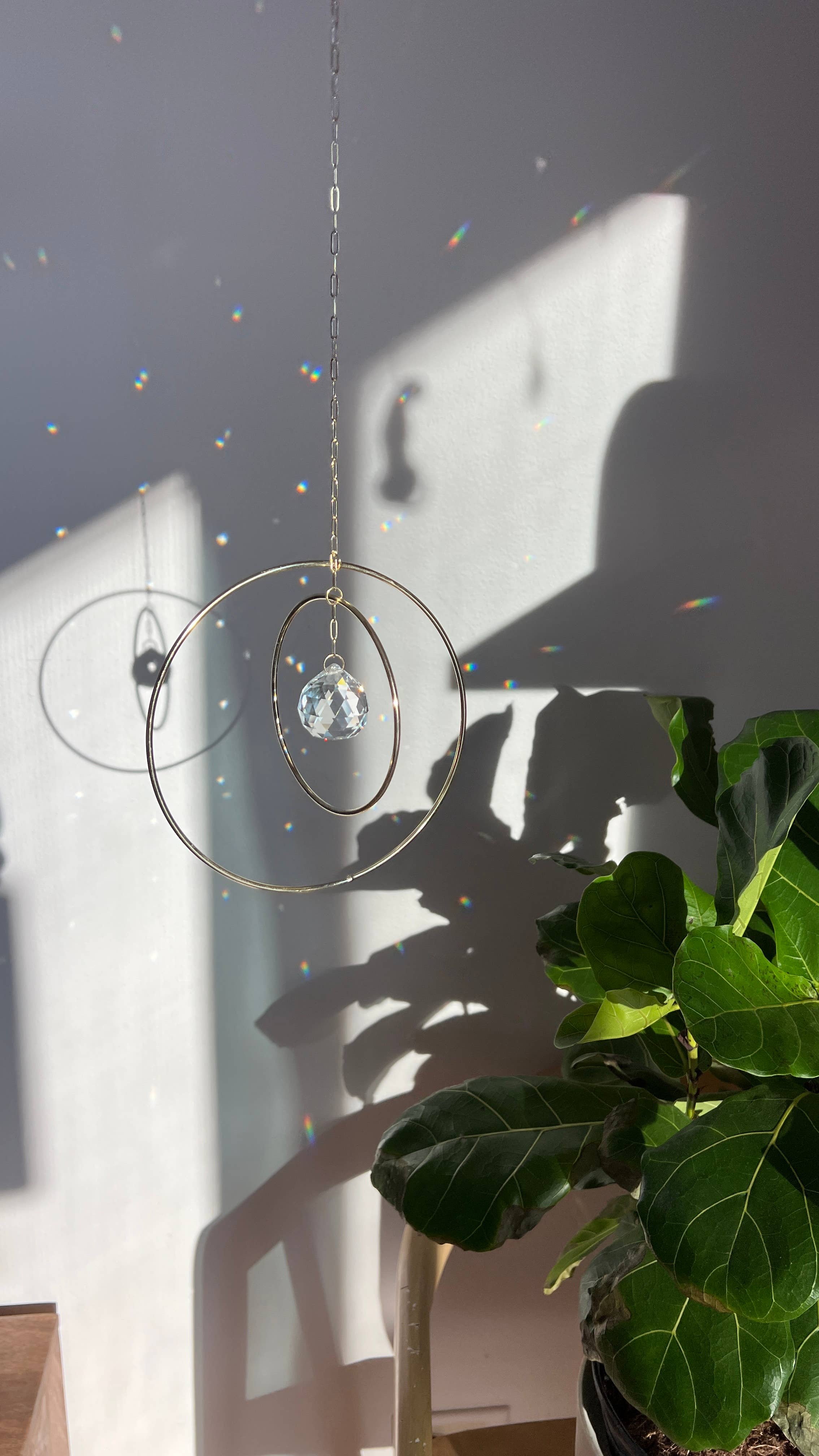 Ombra & Luce – wholesale Suncatcher – Galaxy Suncatcher, kinetic decor moving rings, lightcatcher