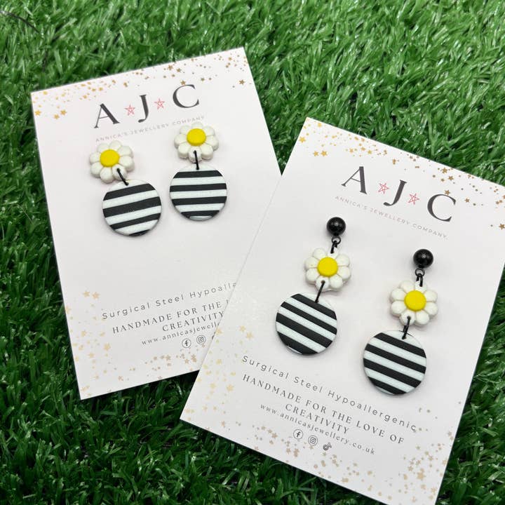 Black and White Striped Daisy Dangles for wholesale by Annica’s Jewellery Co