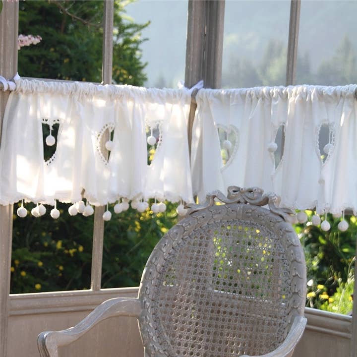 Brise bise curtain with white pompoms for wholesale by LES SCULPTEURS DU LAC