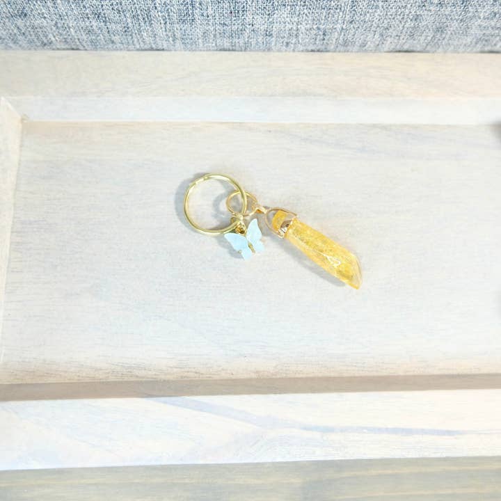 Yellow Rey's with Blue Butterfly Kyber Crystal keychain Star Wars, unique gift, collectable. for wholesale by BlueButterflyBazaar
