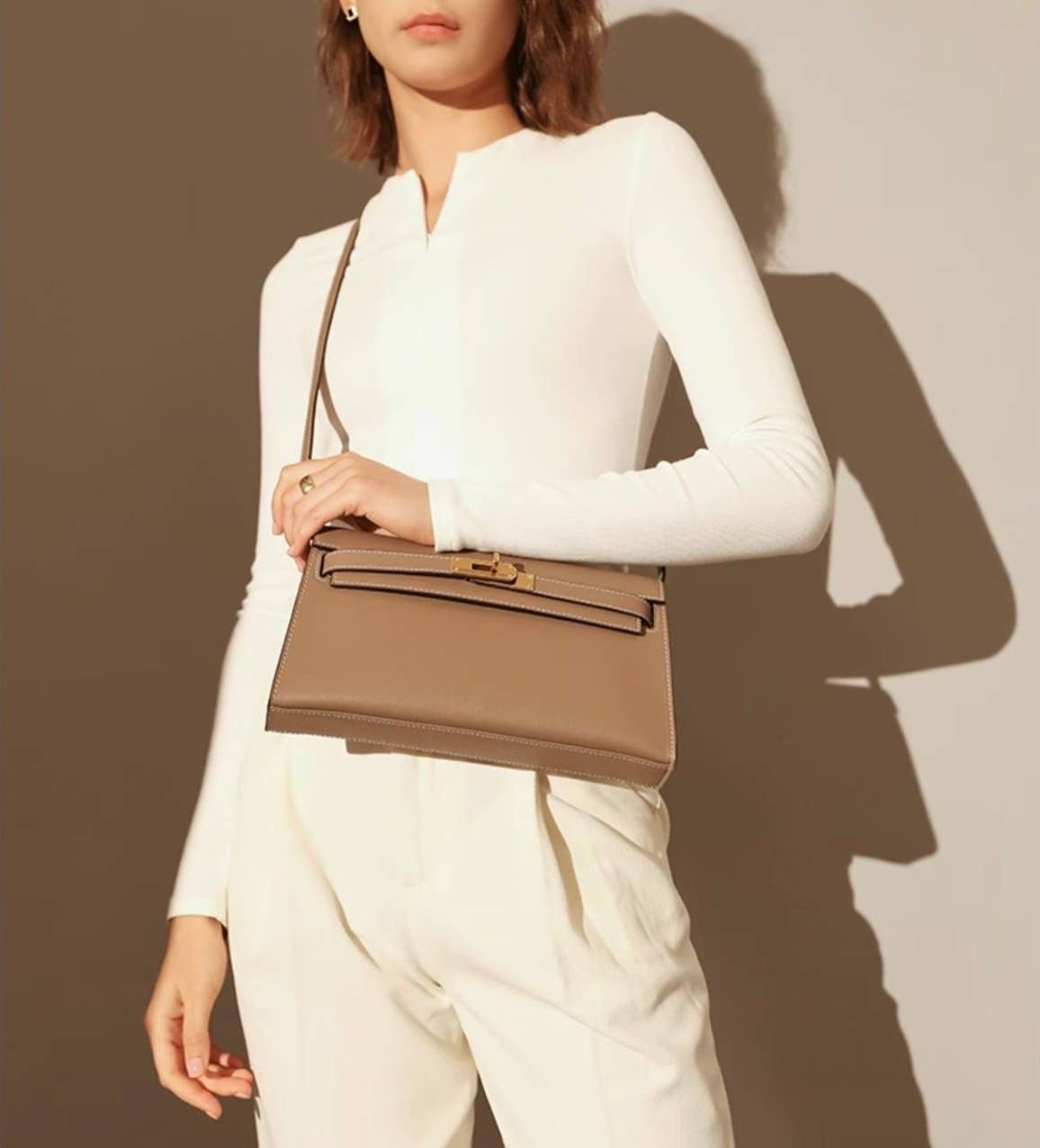 Sook Stainable - Vendita all'ingrosso Tracolla - Donna - Borsa a tracolla a busta in vera pelle con chiusura metallica18