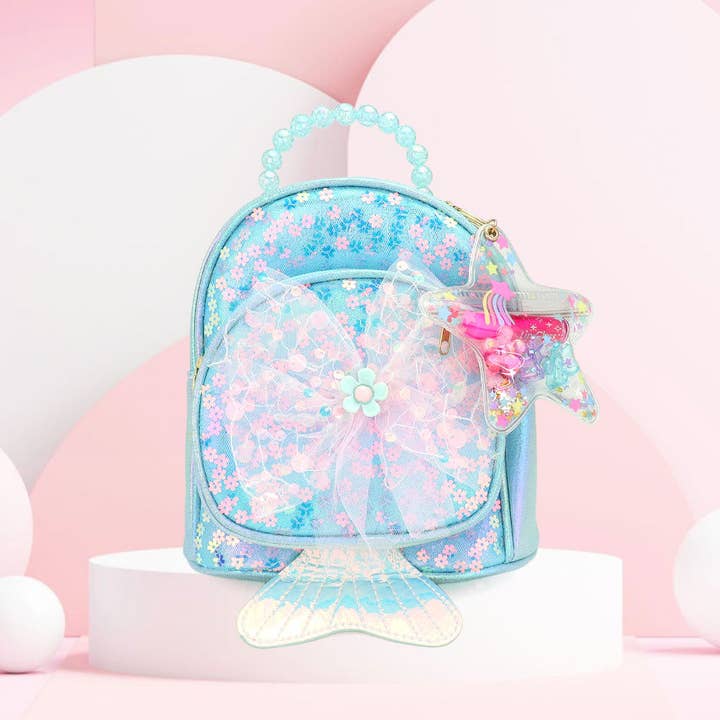 FOCUS CALDO - Zainetto Mini Minuscolo con Fiocco Centrale a Fiore, Coda di Pesce a Punta, Fiori con Paillettes e Pochette Portachiavi a Stella per la vendita all'ingrosso da parte di Madeline Love
