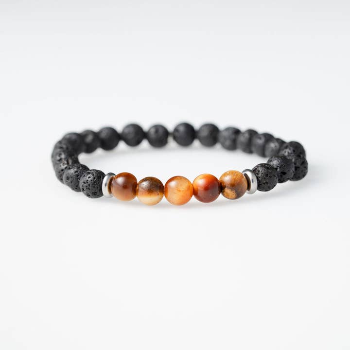 Natural Orange Tiger Eye Stone And Black Lava for wholesale by Virgin River Naturals