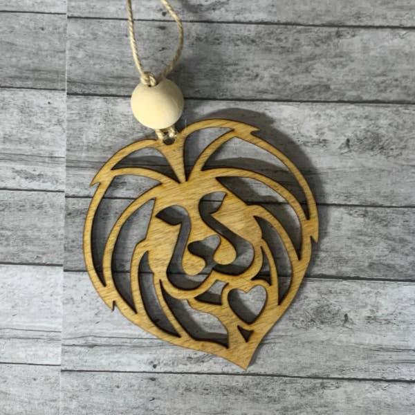 A Story of Strength and Protection Lion Ornament for wholesale by Plums & Roses