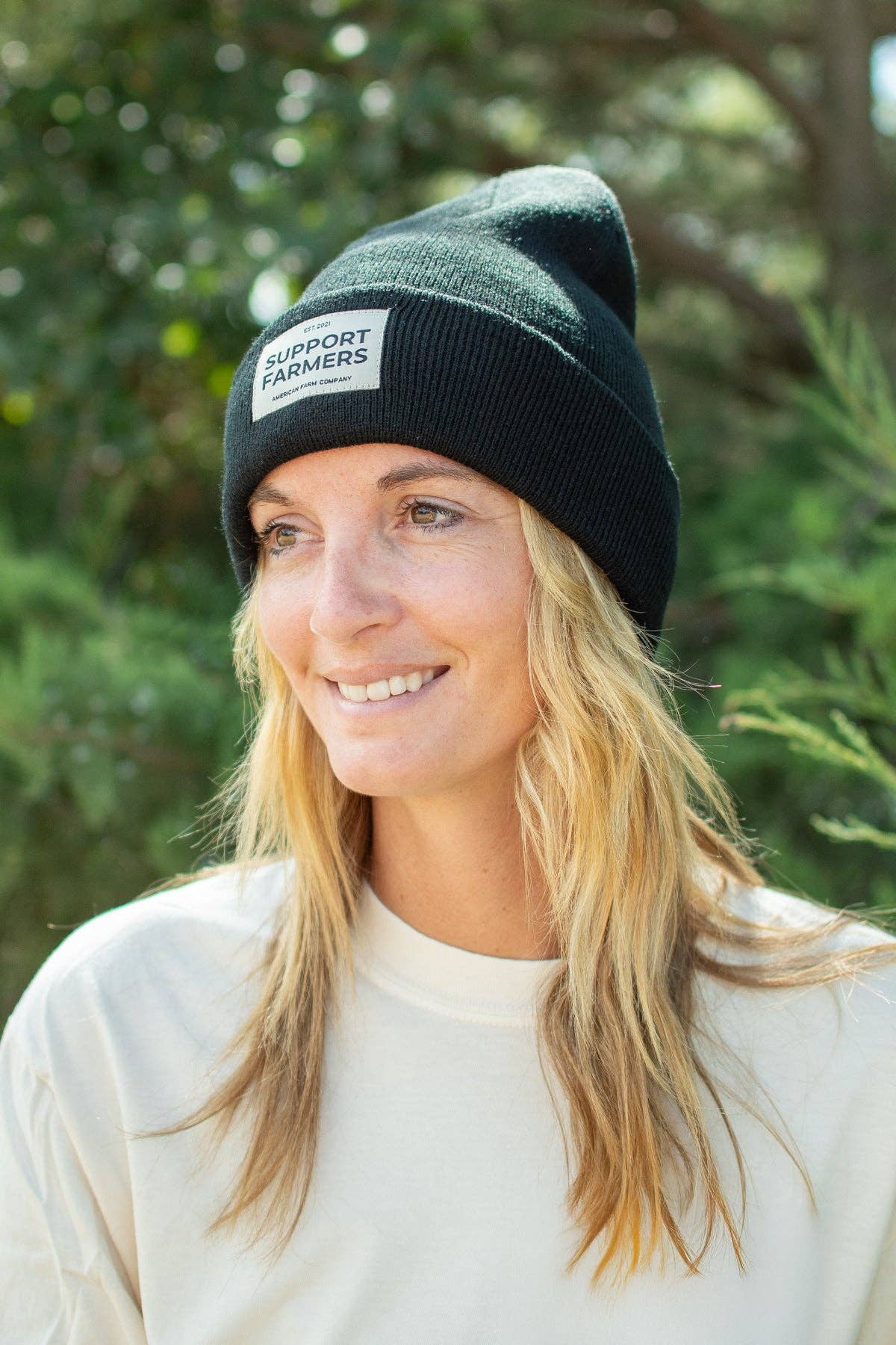 Black ‘Support Farmers’ Beanie for wholesale on Faire2