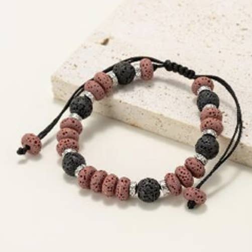 Bracelets made of round and flat beads in natural lava stone for wholesale by INNOBIZ
