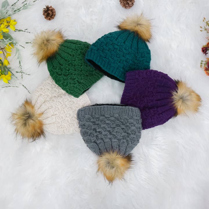 Hand Knit Woolen Pom Pom Hat with Fleece Lining for wholesale by Karma Nepal Crafts
