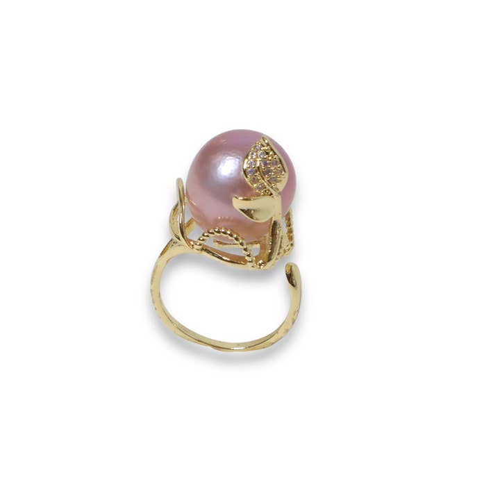 Bague en perle baroque dorée. pour la vente par Ninemoo