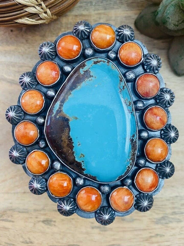 Pulsera de puño artesanal de espinas naranjas, turquesa y plata de ley firmada. para venta al por mayor de Nizhonitradersllc