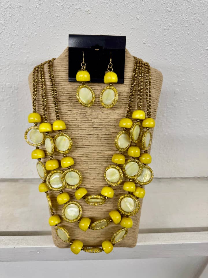 6 STRANDS GOLD SEED BEADS WITH THREE STRANDS YELLOW WOOD WIT for wholesale by International Duru's