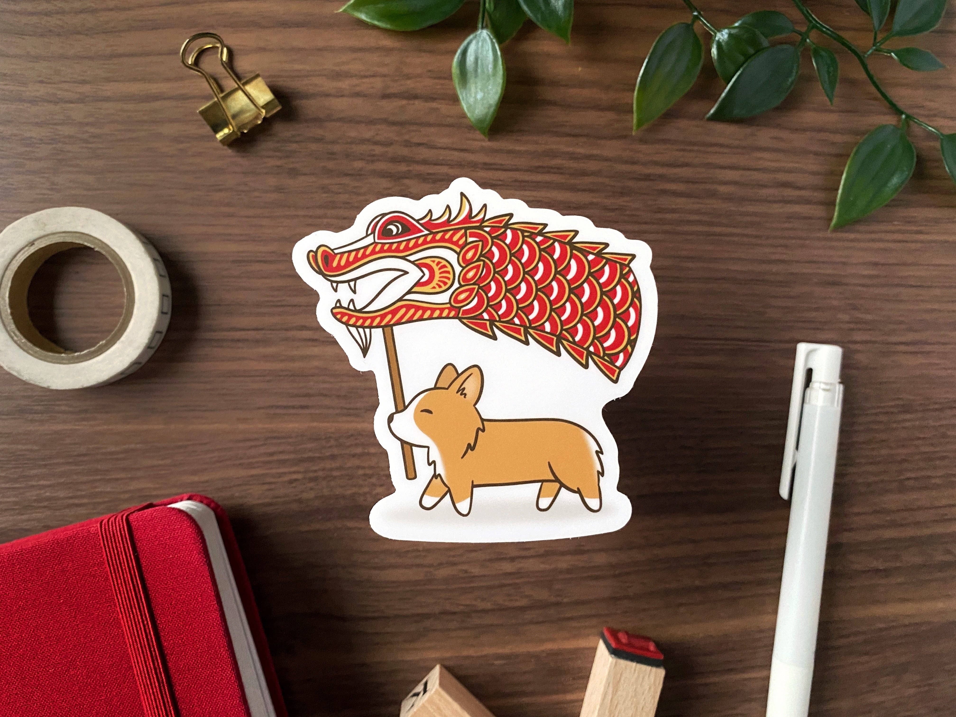 Kela Designs - Wholesale Sticker - Dragon Corgi vinylsticker voor het nieuwe jaar op de maan