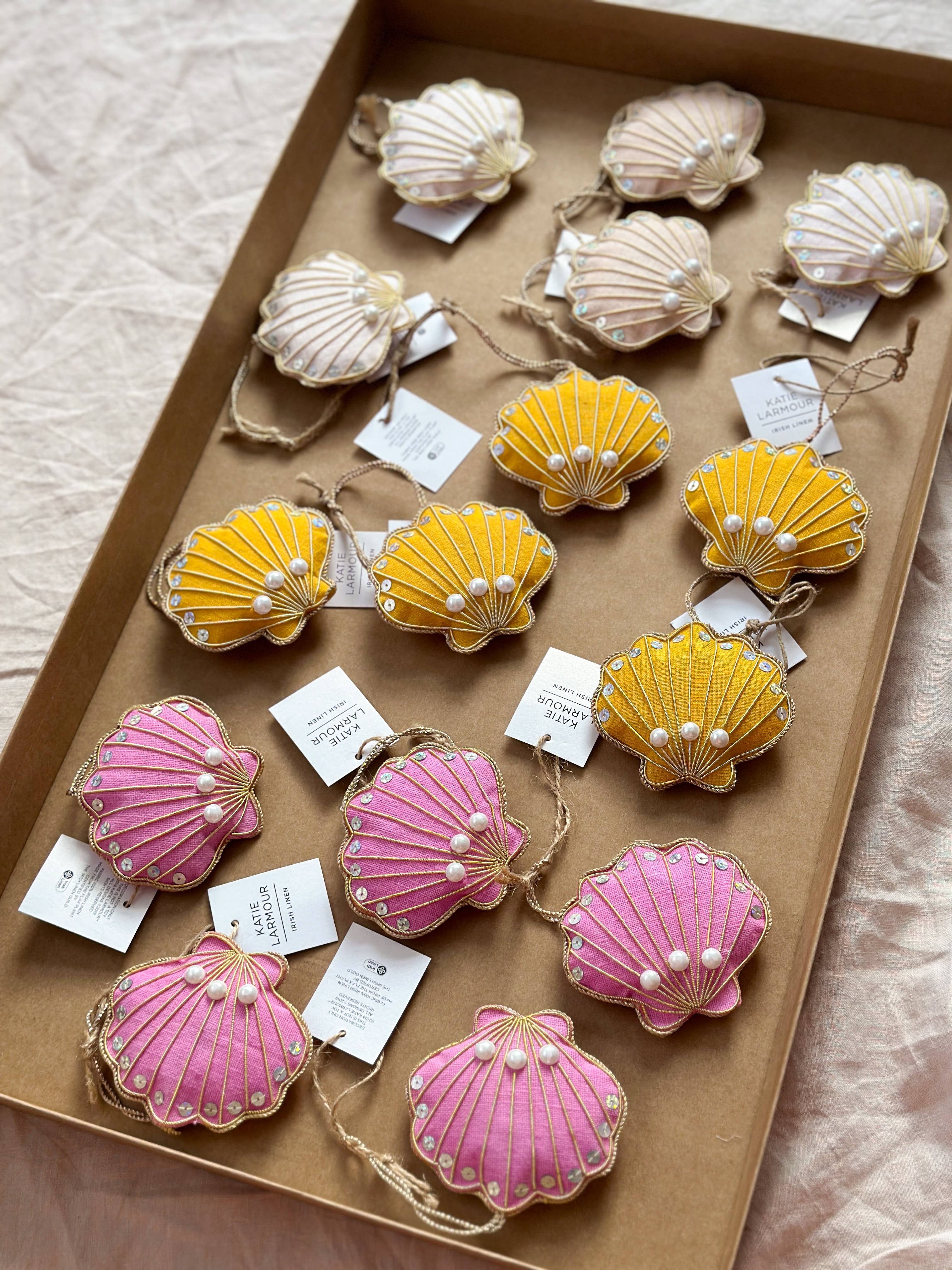 Katie Larmour Linen – wholesale Ornament set – (15 pcs) Assorted Pink Yellow Shells Linen Handmade Ornament